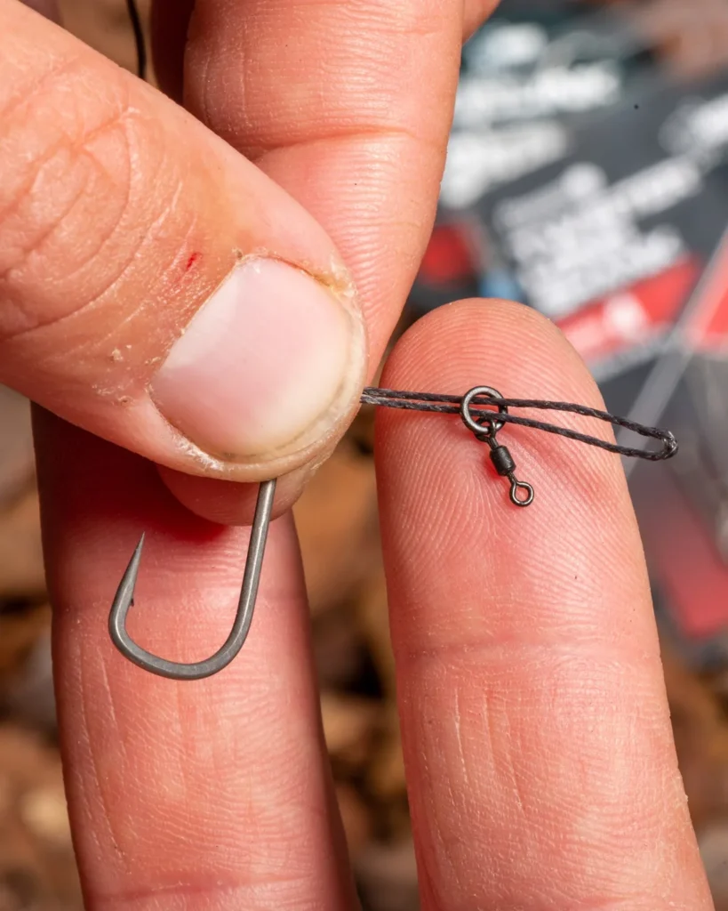 Small micro swivel mounted on a loop ready to form the sliding D.