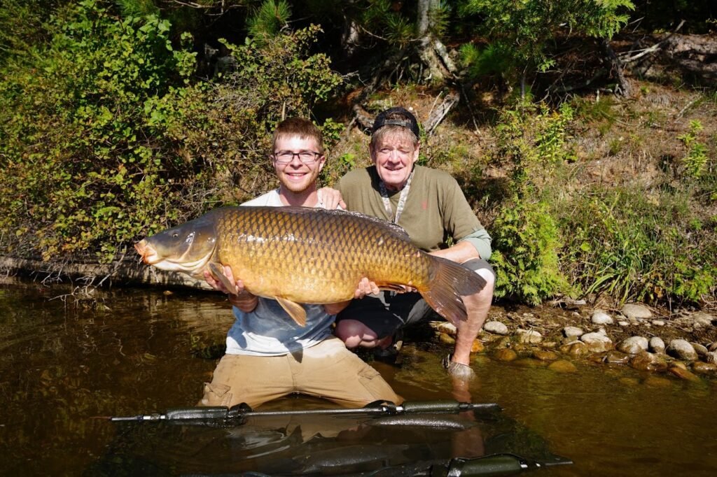 David and Robert pictured together with David’s 45 lb 8 oz wild common carp.